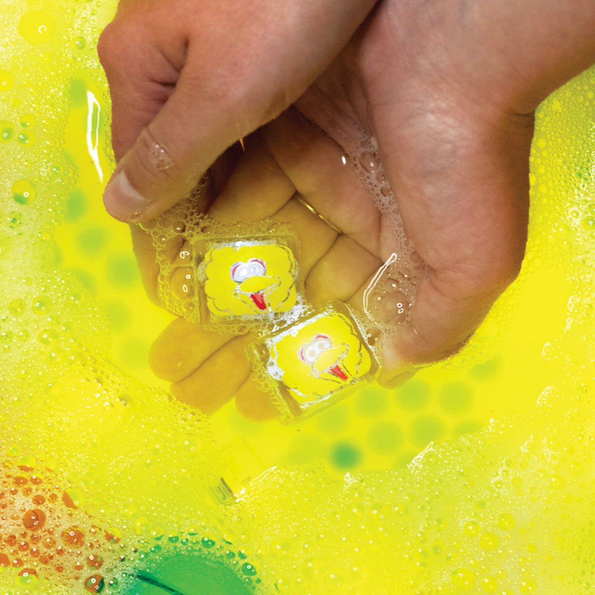 [Big Bird] Big Bird cubes glowing in yellow water
